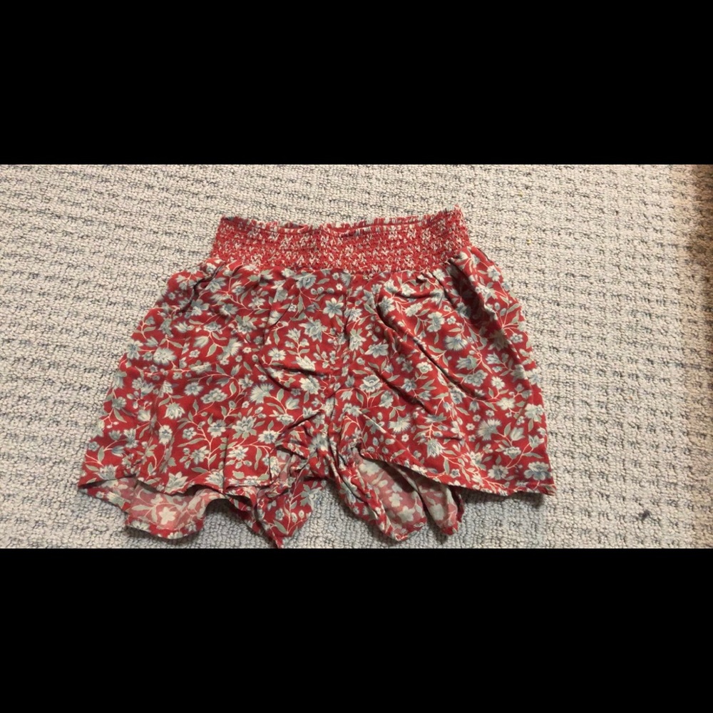 red and green floral shorts